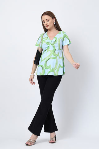 Close-up texture of Floral Maternity Top for Zipless Feeding - Pista in pista, showing the soft Cotton fabric.