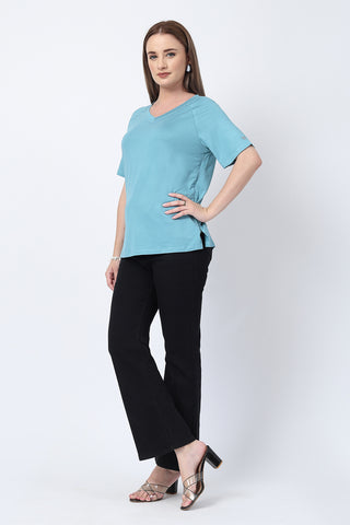 Side or angle view of Sea Green Solid Nursing Top with Side Zip Access showing the Maternity Tops silhouette and fit.