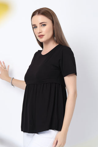 Side or angle view of Black Maternity Zipless Feeding Gathered Top showing the Maternity Tops silhouette and fit.
