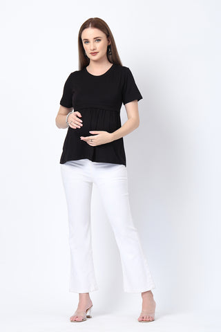 Detail shot of Viscose fabric; shows stretch and black color/print.