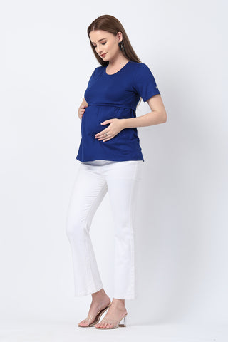 Detail shot of Viscose fabric; shows stretch and blue color/print.