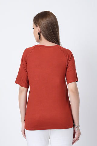 Model wears rust Maternity Tops; stylish maternity fit with Long Zip function.