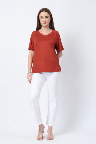Side or angle view of Rust Solid Nursing Top with Side Zip Access showing the Maternity Tops silhouette and fit.