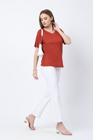 Styling detail of Rust Solid Nursing Top with Side Zip Access, highlighting rust print and Maternity Tops design.