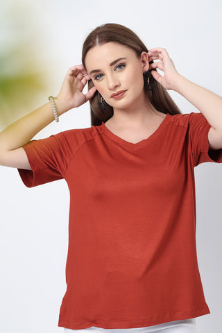 Smooth back view of rust Maternity Tops showing silhouette for comfort.