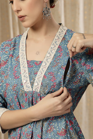 Side Profile of Teal Blue Nursing Dress showing Feeding Zips & Pockets & Fit