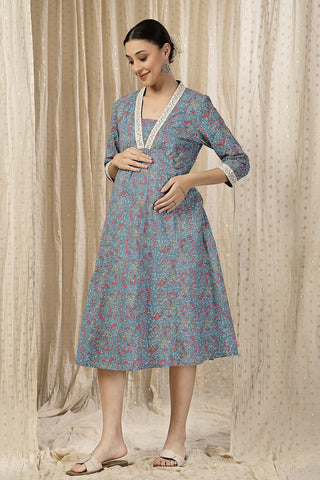 Back View of Floral Rayon Midi Dress with Feeding Zip and Pockets - Flattering Silhouette for Pregnancy