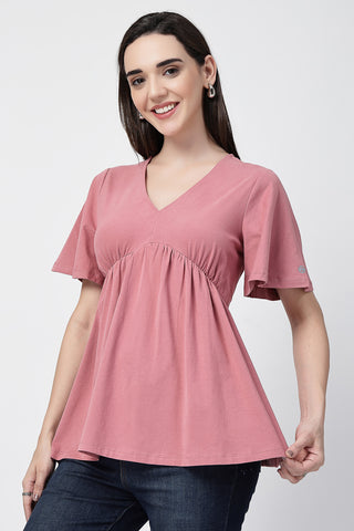 Smooth back view of pink Maternity Tops showing silhouette for comfort.