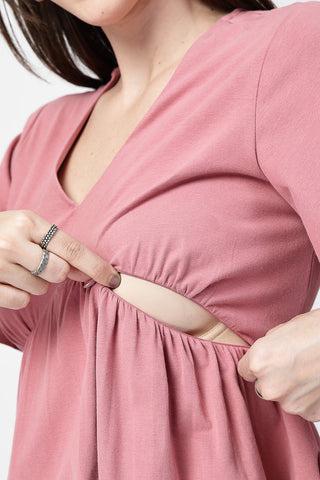 Model wears pink Maternity Tops; stylish maternity fit with Long Zip function.