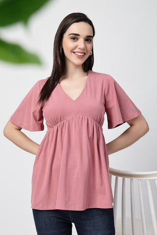 Close-up texture of V-Neck Cotton Maternity Nursing Top - Deep Salmon in pink, showing the soft Cotton fabric.