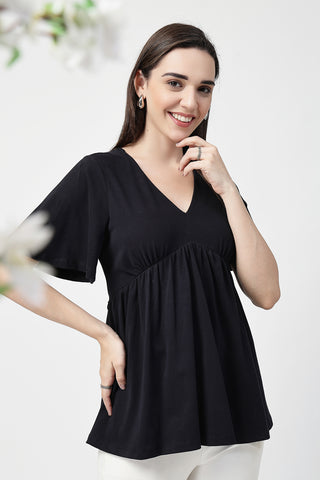 New mom wearing black Maternity Tops; shows flattering post-delivery fit and Long Zip.