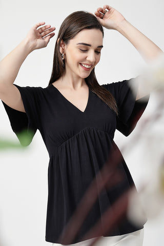 Smooth back view of black Maternity Tops showing silhouette for comfort.