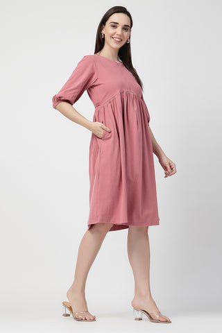 Woman wearing Maternity & Nursing Knee-Length Cotton Dress with Pocket in Deep Salmon - Pre & Post Pregnancy