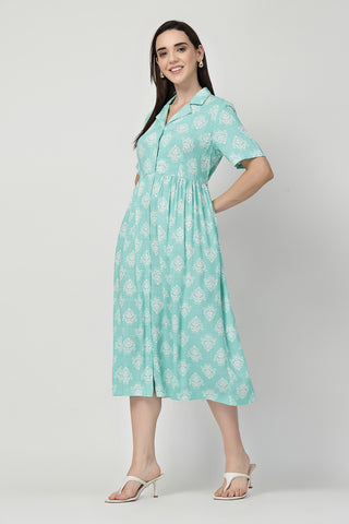 Woman wearing Zipless Feeding Shirt Dress with White Leafy Print in Mint Green - Pre & Post Pregnancy
