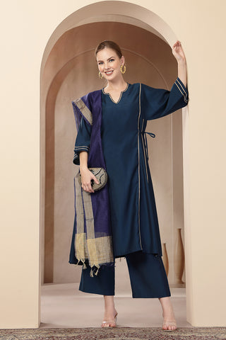 High-quality image of the Roman Silk texture and finish of the Teal Concealed Zip Suit Set.