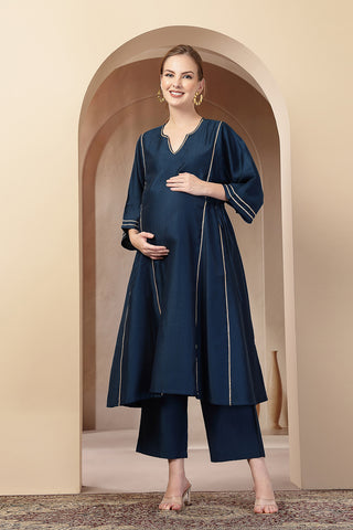 Side profile of the Teal Concealed Zip Suit Set, showing the smooth drape of the Roman Silk fabric.