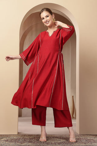 Side profile of the Red Concealed Zip Suit Set, showing the smooth drape of the Roman Silk fabric.