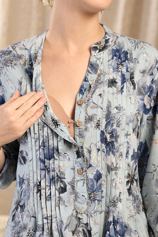 Model wearing Sky Blue Top; garment provides coverage and shape for a changing body.