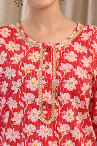 Red Floral Print; detailed floral pattern enhances the garment design.