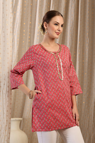 Pink Booty Top detail; shows fit across the chest and shoulders.