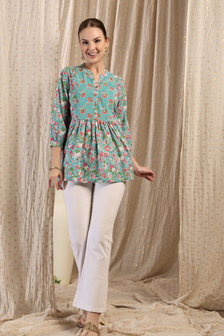 Side or angle view of Maternity Zipless Feeding Peplum Top - Mint showing the Maternity Tops silhouette and fit.