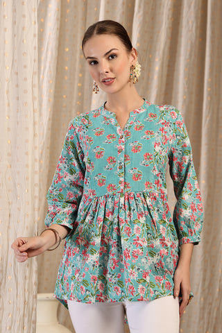 Close-up texture of Maternity Zipless Feeding Peplum Top - Mint in mint-green, showing the soft Cotton fabric.