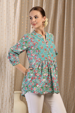 Styling detail of Maternity Zipless Feeding Peplum Top - Mint, highlighting mint-green print and Maternity Tops design.