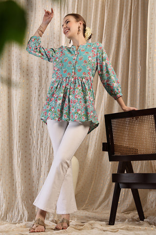 Detailed view of Maternity Zipless Feeding Peplum Top - Mint Zipless access and Cotton construction.