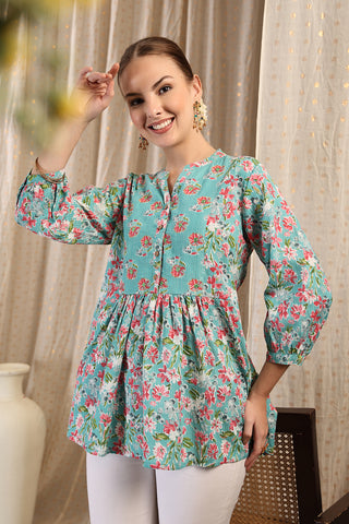 New mom wearing mint-green Maternity Tops; shows flattering post-delivery fit and Zipless.