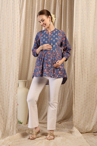 Detail shot of Cotton fabric; shows stretch and federal-blue color/print.