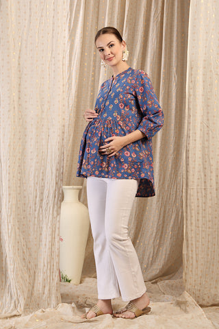 Side or angle view of Maternity Zipless Feeding Peplum Top - Royal Blue showing the Maternity Tops silhouette and fit.
