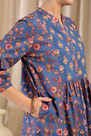 Side or angle view of Maternity Zipless Feeding Peplum Top - Royal Blue showing the Maternity Tops silhouette and fit.