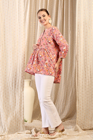 Detail shot of Cotton fabric; shows stretch and peach color/print.