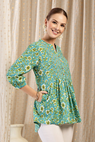 Detailed view of Maternity Zipless Feeding Peplum Top - Sea Green Zipless access and Cotton construction.