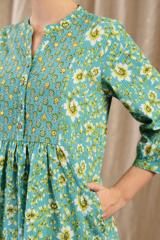 New mom wearing sea-green Maternity Tops; shows flattering post-delivery fit and Zipless.