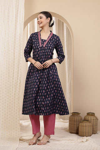 Model action shot of the Embroidered Floral Cotton Kurta Set, demonstrating ease of movement and fit.