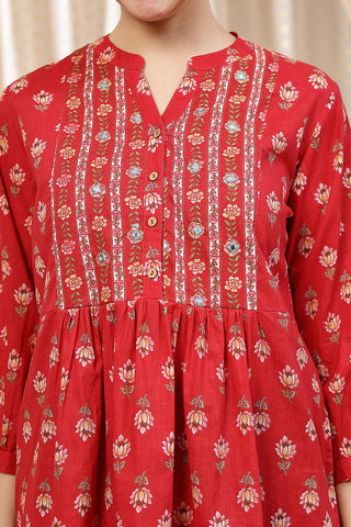 Side or angle view of Maternity Zipless Feeding Peplum Top - Rust showing the Maternity Tops silhouette and fit.