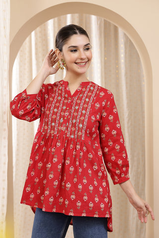 Styling detail of Maternity Zipless Feeding Peplum Top - Rust, highlighting rust print and Maternity Tops design.