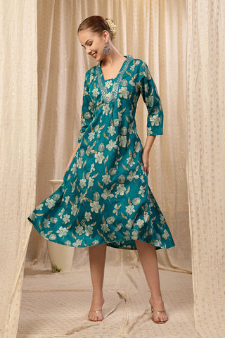 Model action shot of the Embroidered Floral Foil Kurta Set, demonstrating ease of movement and fit.
