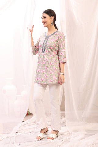 Close-up texture of Embroidered Floral Maternity Top with Zip Feeding - Pink in pink, showing the soft Rayon fabric.