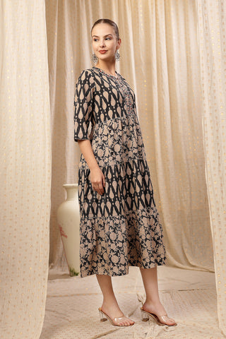 Model posing, highlighting the accessible discreet nursing zips of the Ethnic Cotton Tiered Kurti for Feeding Kurti.