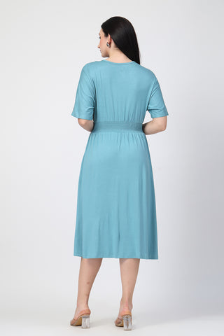 Close Up of Soft Fabric Detail on Sea Green Solid Smocked Waist Zipless Feeding Dress