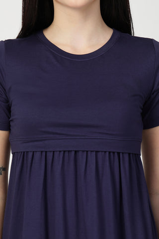 Side or angle view of Navy Maternity Zipless Feeding Gathered Top showing the Maternity Tops silhouette and fit.