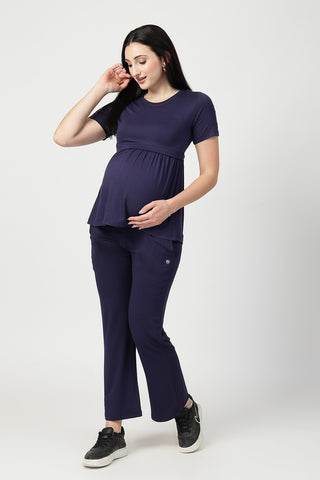 Detail shot of Viscose fabric; shows stretch and navy color/print.