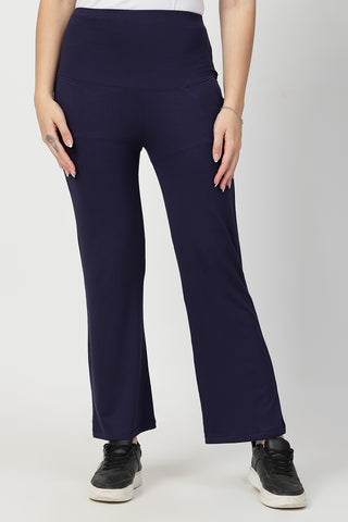 Navy Pants side view; flared bottom balances body shape.
