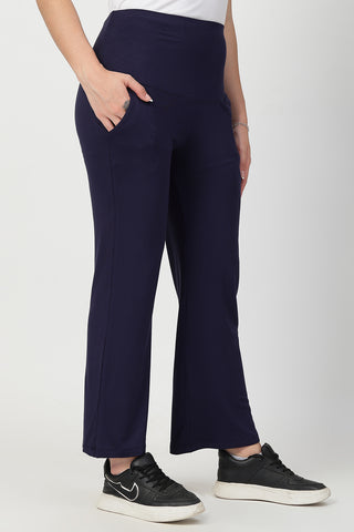 Navy Pants hem; flare adds movement and visual interest.
