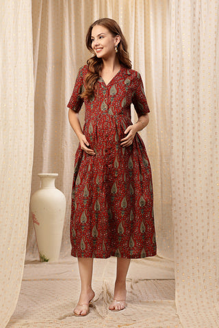 https://houseofzelena.com/collections/new-arrivals/products/rust-red-zipless-maternity-lapel-dress-with-pockets