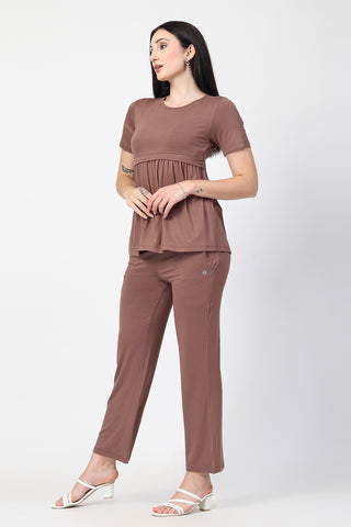 New mom wearing brown Maternity Tops; shows flattering post-delivery fit and Zipless.