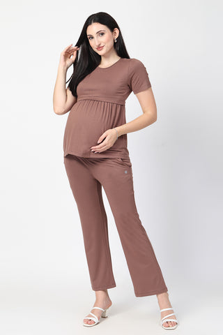 Detail shot of Viscose fabric; shows stretch and brown color/print.