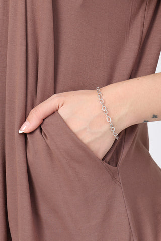 Interior view of Mocha Pleated Zipless Nursing Top showing Zipless.